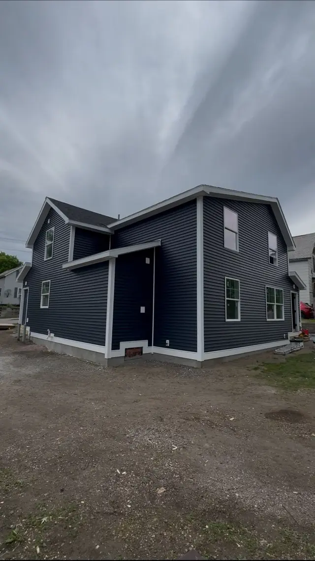 Navy siding installed by Teddy Pro Exteriors