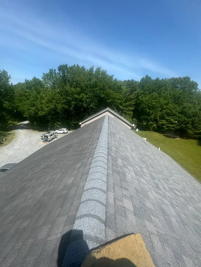 Ridge cap on a roof finished by Teddy Pro Exteriors